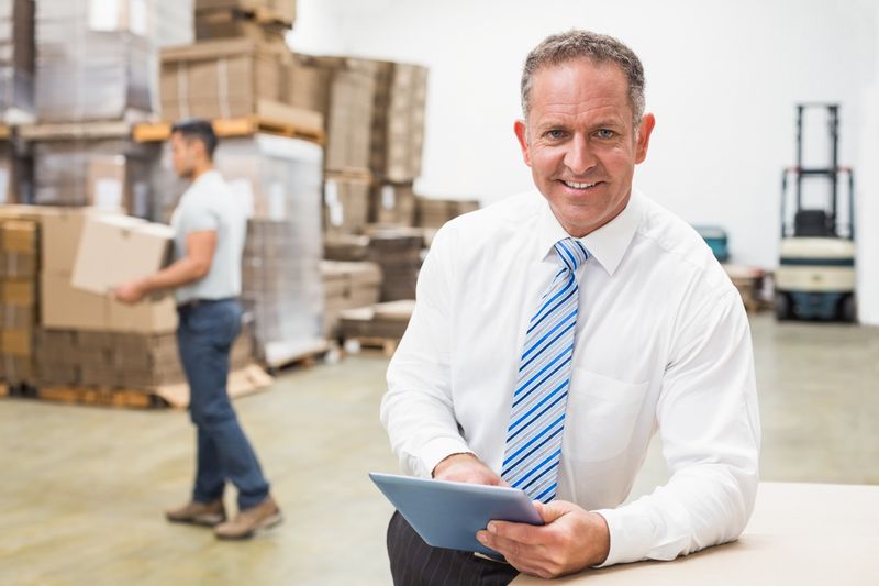 Businessman in warehouse